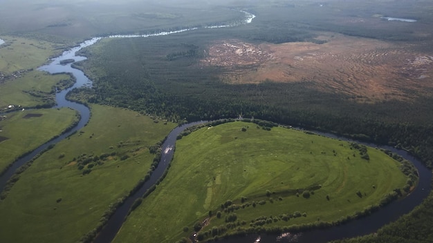 Airplane view of the forests, rivers and landscape of the Russian North, Russia.