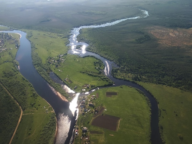 Airplane view of the forests, rivers and landscape of the Russian North, Russia.