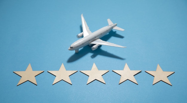 Airplane with a 5 stars on the blue background