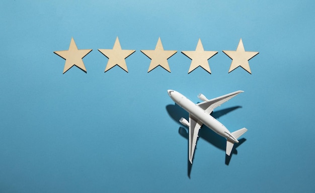 Airplane with a 5 stars on the blue background