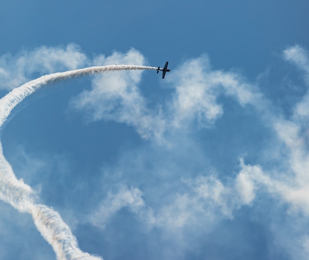 Airplane with a trace of smoke