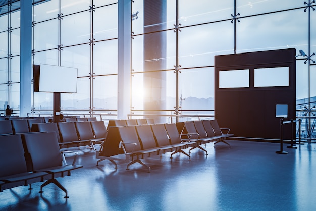 Airport terminal building interior and glass windows