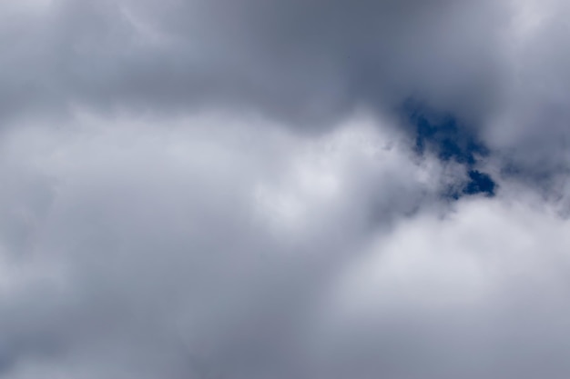 Airy white clouds waiting for rain