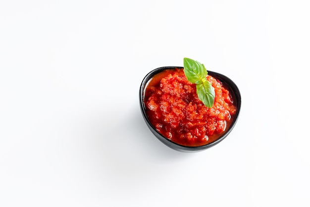 Ajika isolated on a white background hot sauce