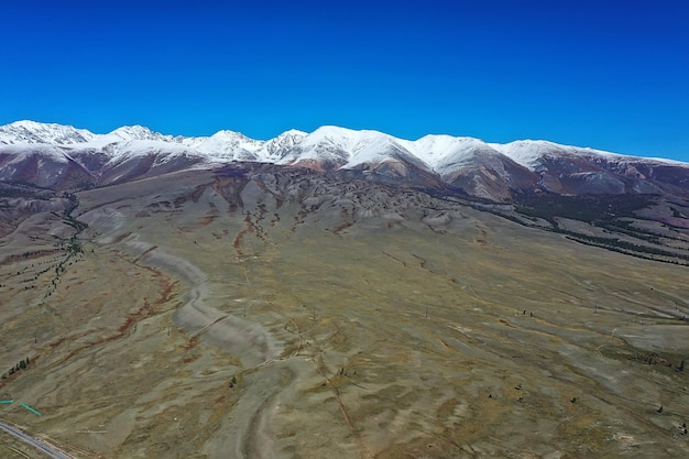 Aktru panorama of mountains altai, mountain peak summer landscape in russia