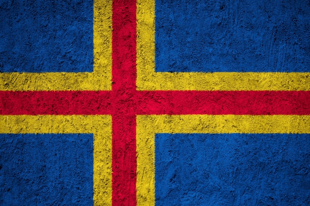 Aland flag painted on grunge wall