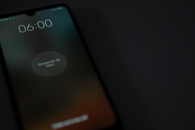 Alarm clock on your phoneThe alarm on the phone rang at 6 am Copy space