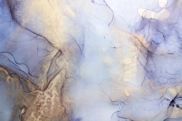 Alcohol ink abstract background Blue golden luxury acrylic paint in water Texture of marble Print pattern