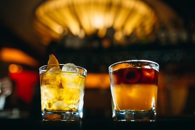 Alcoholic cocktails on the bar table.