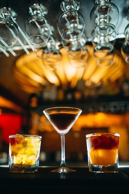 Alcoholic cocktails on the bar table.