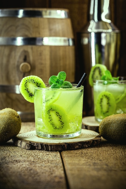 Alcoholic drink with kiwi, called mojito, summer drink, served cold