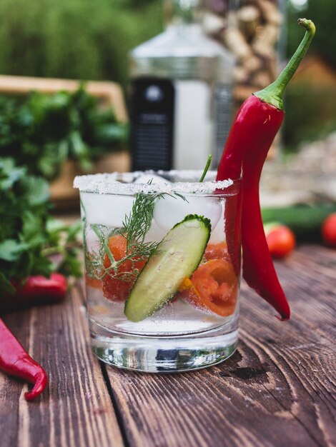 alcoholic drink with red pepper and ice