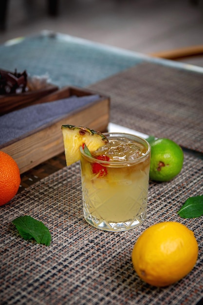 Alcoholic refreshing cocktail Mai tai with rum liqueur syrup lime juice mint and crushed ice