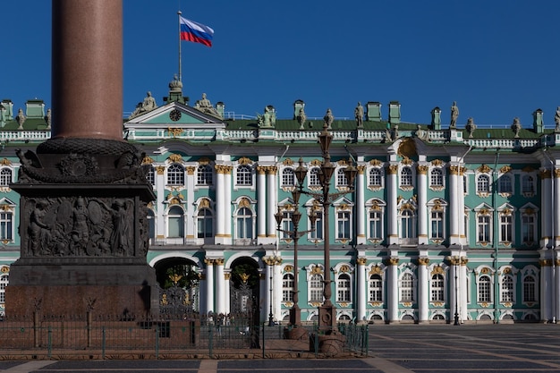 Alexander Column base and Winter Palace building against clear blue sky St Petersburg Russia