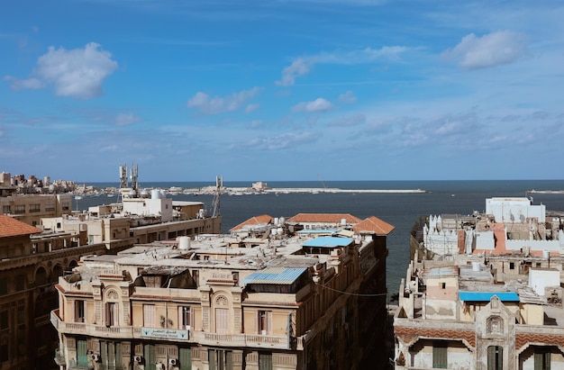 Alexandria, Egypt - 12.11.2021: Beautiful egyptian cityscape and sea view, historical arabic buildings