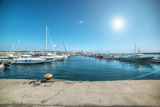 Alghero harbor under a shining sun