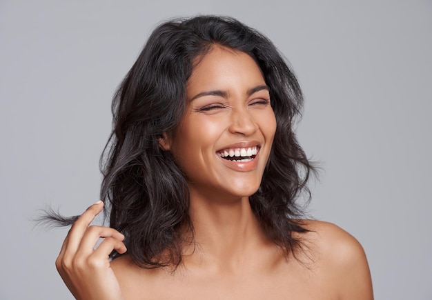 All natural beauty Shot of a beautiful young posing over a gray background