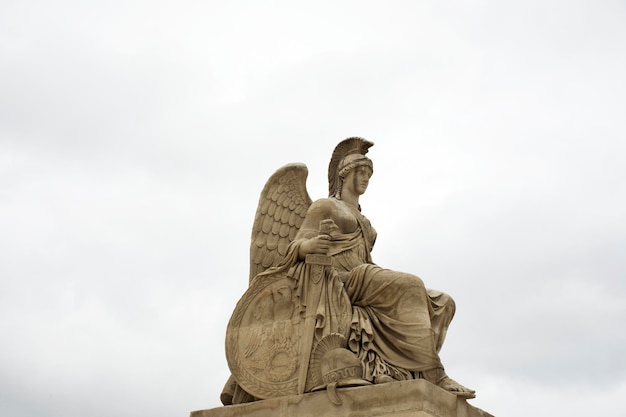 Allegory statue of Victorious France at Carrousel Arc de Triomphe or Arc de Triomphe du Carrousel near Musee du Louvre or the Grand Louvre Museum in Paris France