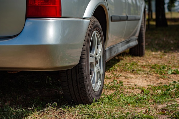 Alloy car wheel rim with break and tire close up view