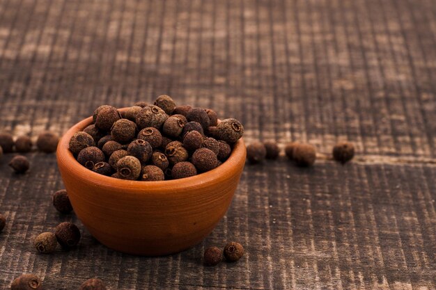 Allspice in the ceramic dish