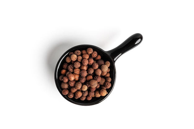 Allspice isolated on a white background Seasoning High quality photo