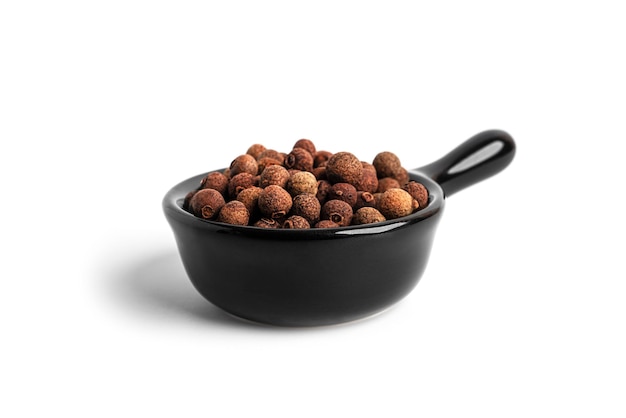 Allspice isolated on a white background Seasoning High quality photo