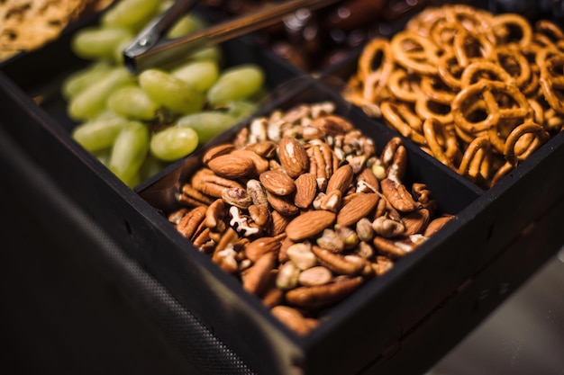 Almond Almonds and other snacks in a beautiful wooden box