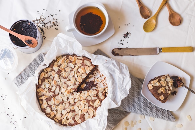 Almond kuchen, tea and wooden spoons