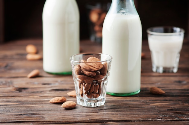 Almond milk on the wooden table