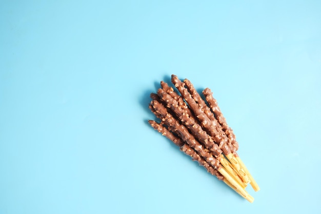 Almond nut dark chocolate stick on table