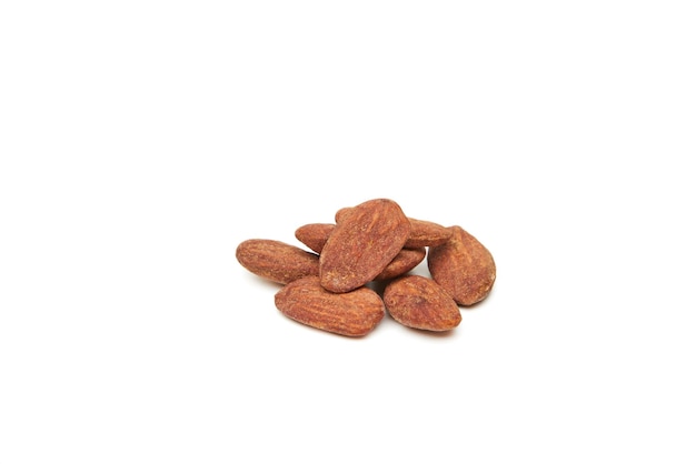 Almond nuts heap isolated on white background.