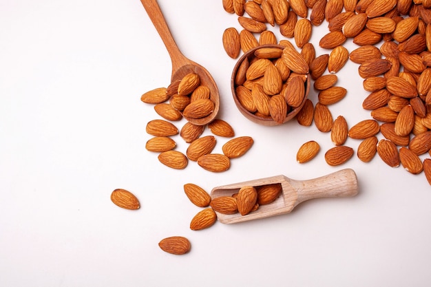 Almond nuts on a white background isolated. View from above