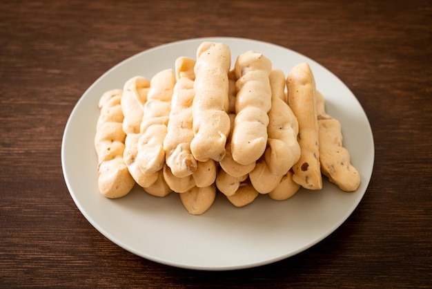 almonds meringue stick on plate - French snack dessert style