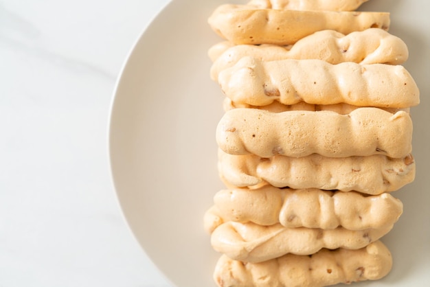 Almonds meringue stick on plate