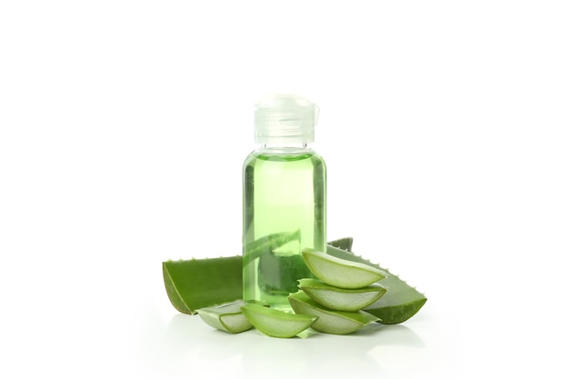 Aloe slices and bottle with gel isolated on white background