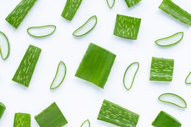 Aloe Vera cut pieces with slices on white background.