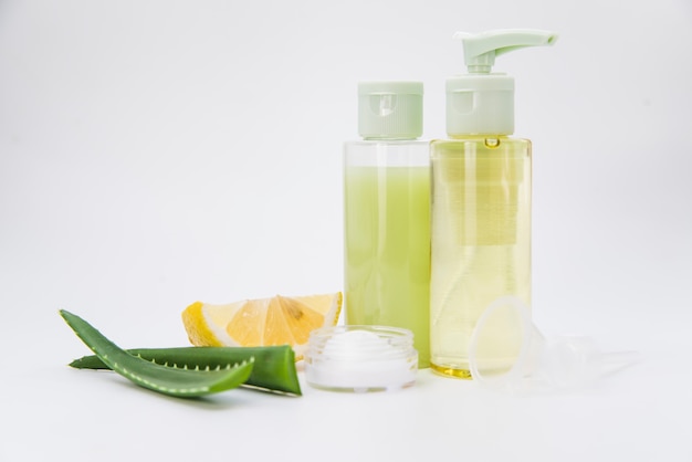 Aloe Vera and lemon natural spray bottle and cream for beauty on white background