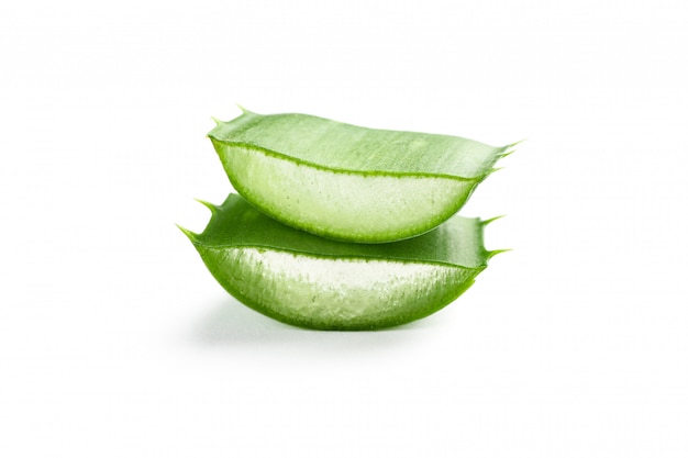 Aloe vera slices isolated on white table