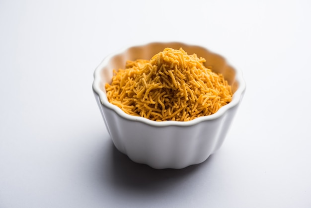 Aloo Bhujiya or Potato Bhujia also known as Namkeen sev. Popular Bikaneri recipe served in a bowl or plate. selective focus