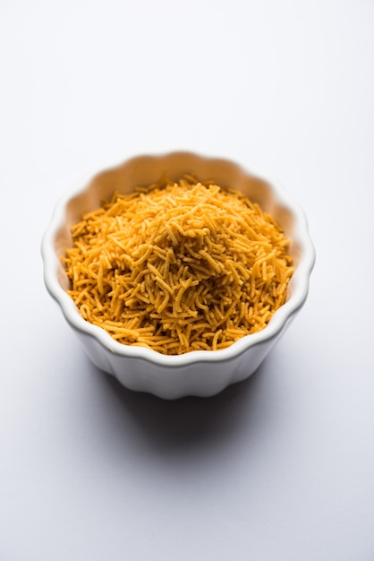 Aloo Bhujiya or Potato Bhujia also known as Namkeen sev. Popular Bikaneri recipe served in a bowl or plate. selective focus