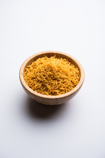 Aloo Bhujiya or Potato Bhujia also known as Namkeen sev. Popular Bikaneri recipe served in a bowl or plate. selective focus