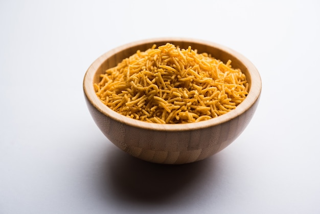 Aloo Bhujiya or Potato Bhujia also known as Namkeen sev. Popular Bikaneri recipe served in a bowl or plate. selective focus