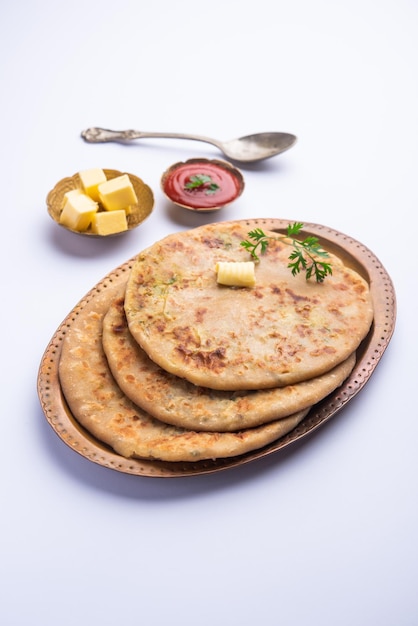 Aloo paratha or gobi paratha also known as Potato or Cauliflower stuffed flatbread dish originating from the Indian subcontinent