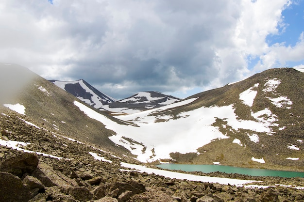 Alpine mountain lake landscape, colorful nature view, Georgian lake, travel destination, hiking place.