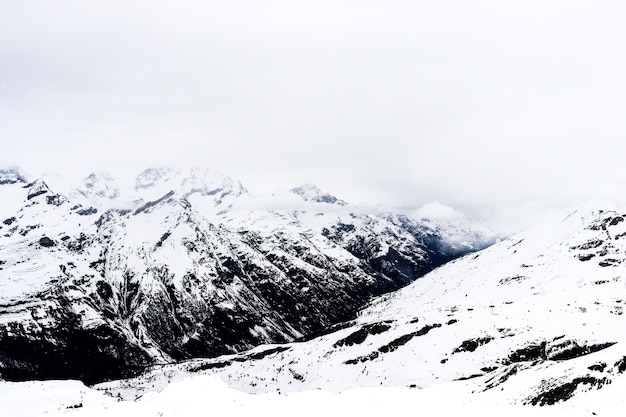 Alpine Mountains in the cloudy day