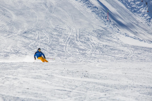 Alpine skier on slope at Cortina