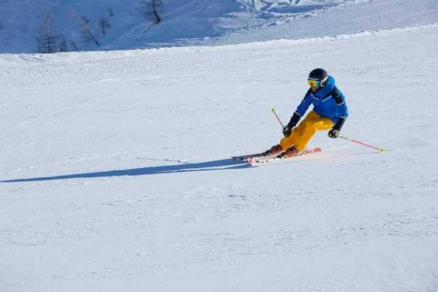 Alpine skier on slope at Cortina