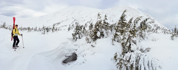 Alpine touring skier in winter mountains. Carpathians, Ukraine.