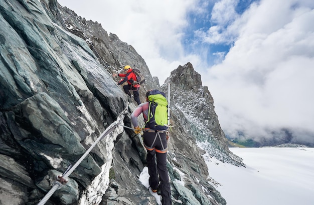 Alpinists climbing Grossglockner mountain Austria