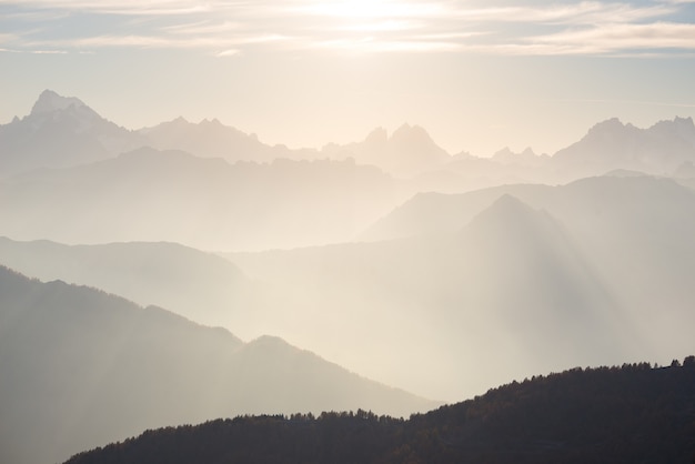 The Alps in soft backlight. Toned mountain range of the Massif des Ecrins National Park, France.